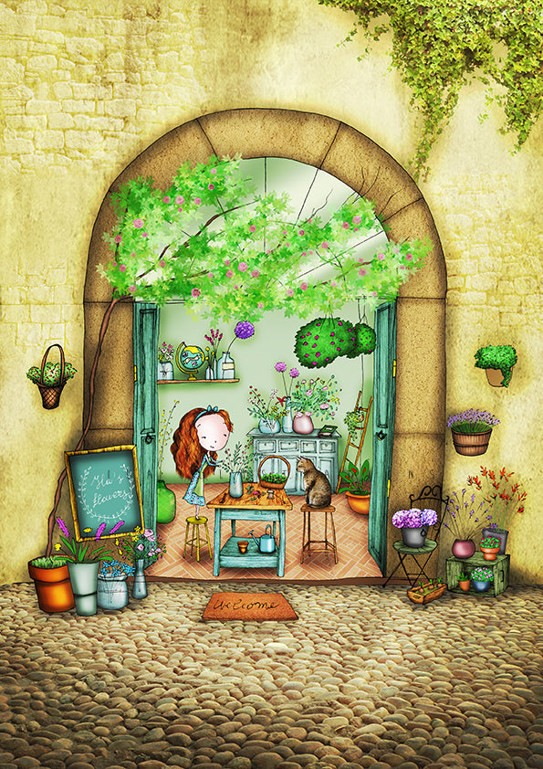 Ila's Flowers Postcard by Ila Illustrations featuring a flower shop storefront scene framed by a stone archway. A woman with long hair stands behind a small table and a cat sits on a chair in a sunlit shop filled with plants and flowers, while the cobblestone street in front is decorated with potted plants and hanging baskets.