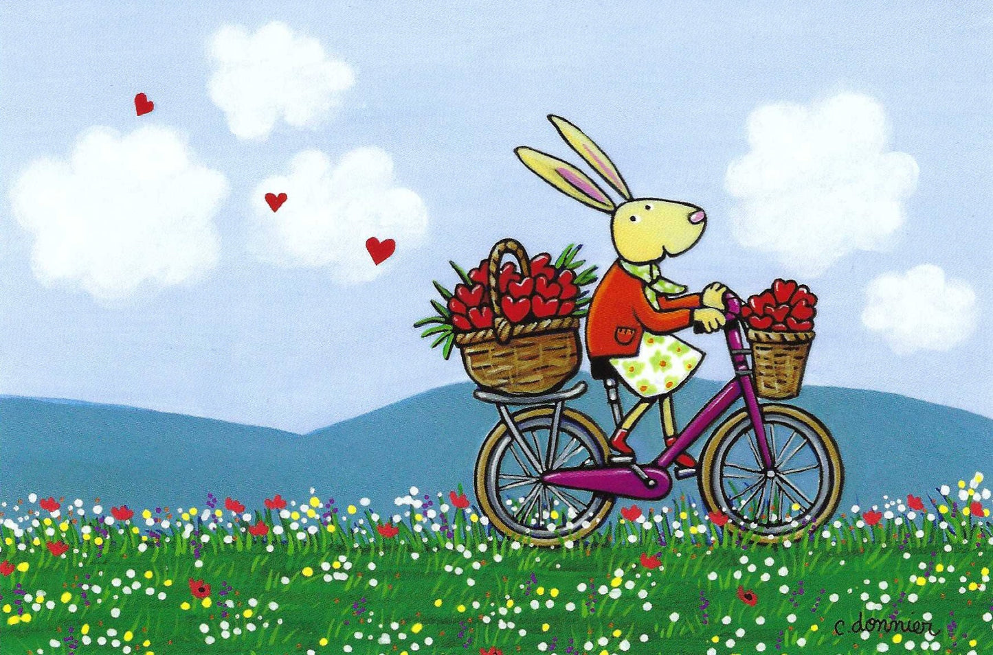 Bunny on a Bicycle Postcard by Christine Donnier - Editions Titi Pinson featuring a rabbit riding a bicycle with baskets of hearts in a flower field