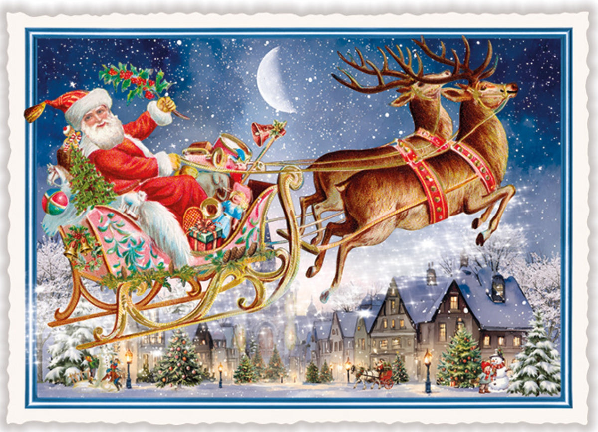 Christmas Sleigh Ride Postcard by Edition Tausendschön (PK1335) featuring a festive Christmas illustration showing Santa Claus in a sleigh pulled by two reindeer flying over a snowy village at night. The scene includes snow-covered trees, houses, a crescent moon, and a blue sky with stars.