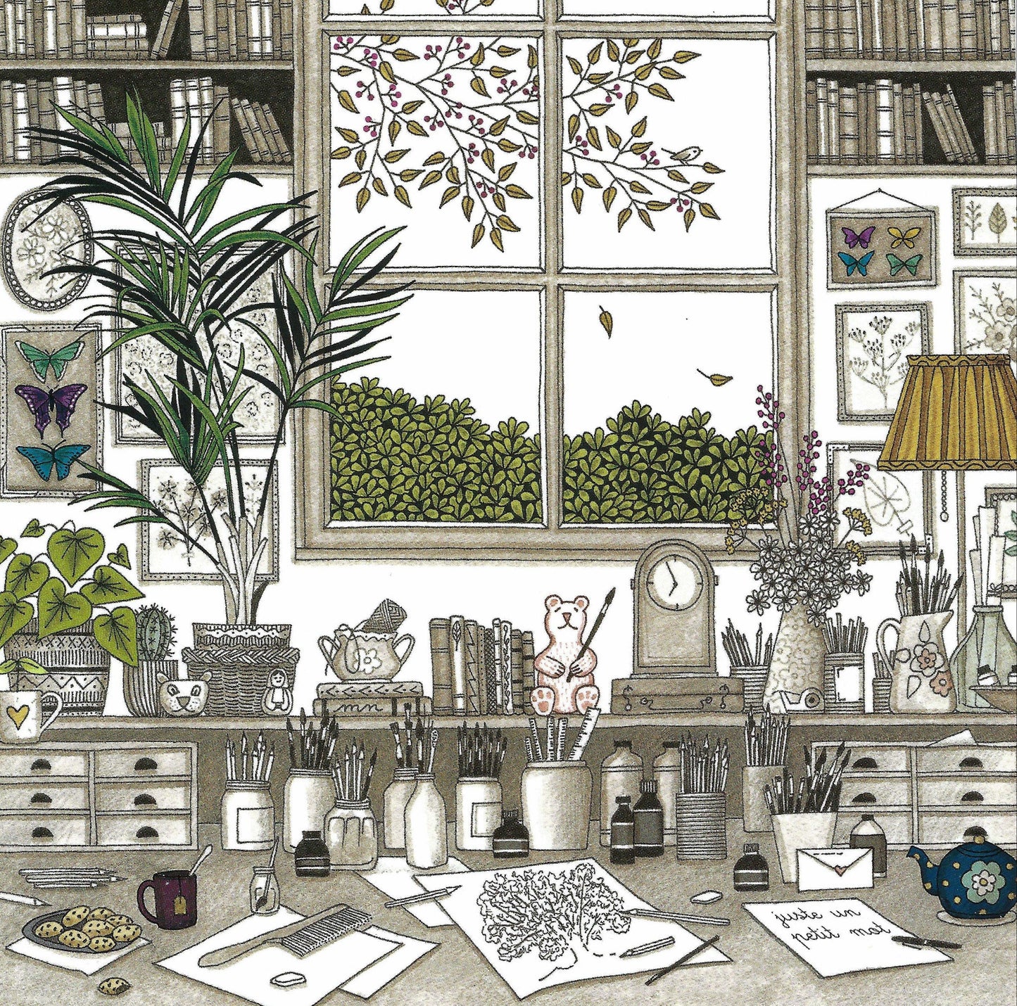 Desk - Art Supplies Postcard by Editions Titi Pinson featuring a desk with art supplies, plants, and a variety of objects such as books, a paintbrush, and a teapot with a window view.