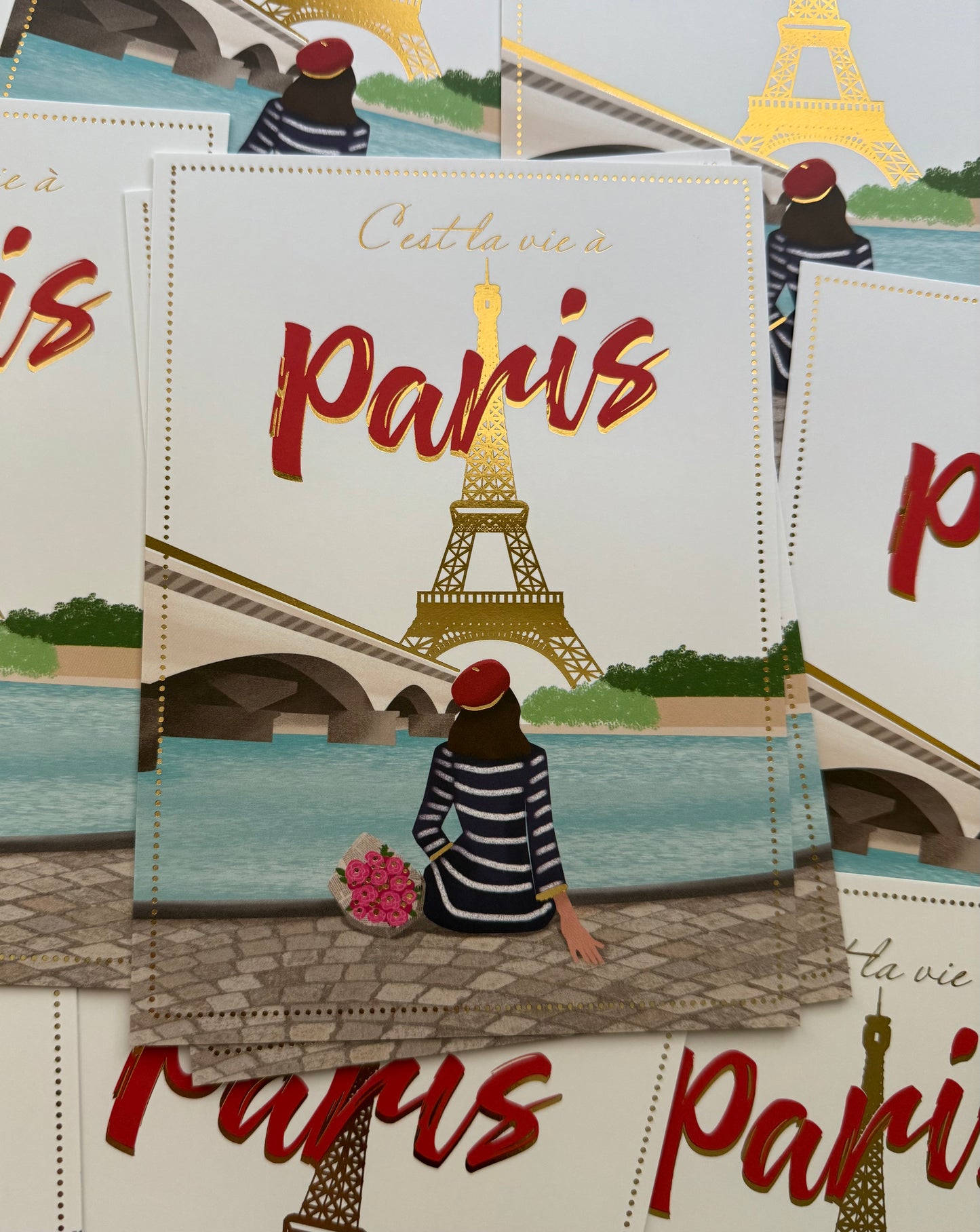 Editor - Art of Emotion - Destination Paris Postcard - C'est La Vie à Paris - Eiffel Tower - Woman - Bouquet - River Seine - Postcard with gold foil details