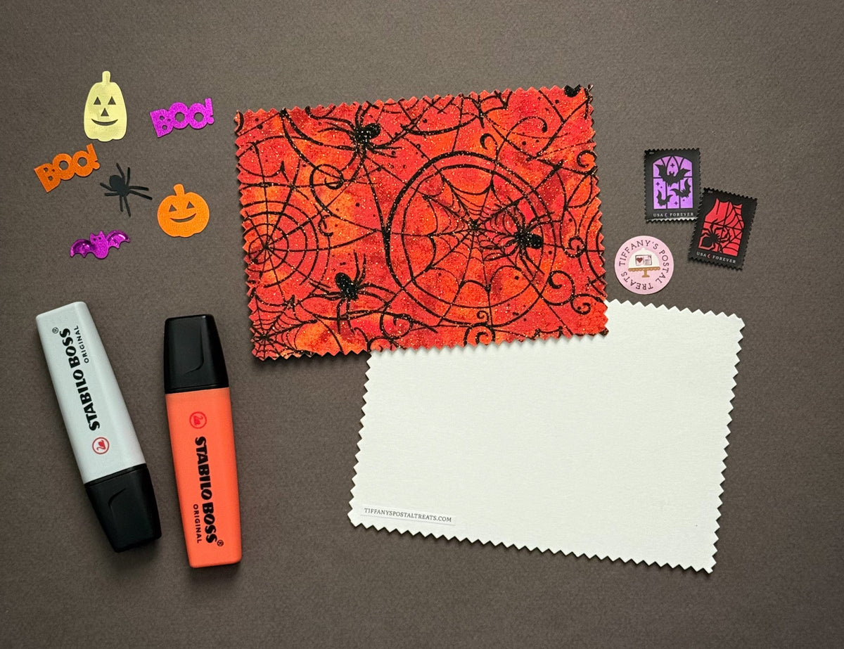 Halloween Fabric Postcard with Halloween-themed design featuring black spiders and webs with glitter accents.