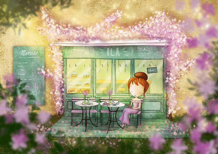 Ila Café Postcard by Ila Illustrations featuring a whimsical illustrated scene of a small cafe storefront framed by pink blossoms, with a seated girl at an outdoor table in front. The artwork has a soft, dreamy style with warm yellow light and purple floral foreground blur.