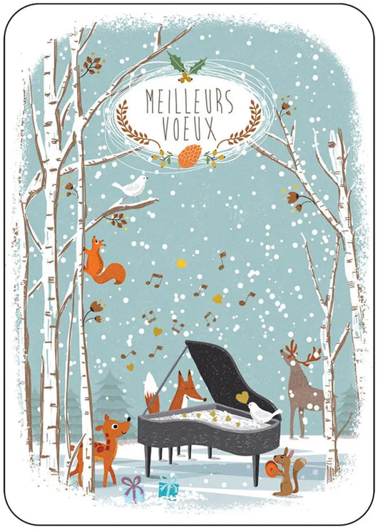 Best Wishes Postcard by Cartes d’Art featuring a festive winter illustration with the French text 'Meilleures Voeux' at the top. The scene shows a snowy forest with birch trees, a black grand piano, a white bird, an orange squirrel, a deer, and a fox, all set against a light blue background with falling snow.