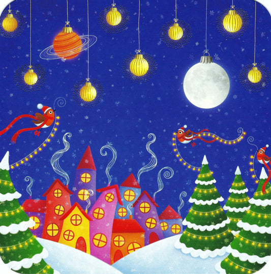 Christmas Village Postcard by Correspondances featuring a festive town with Christmas trees, houses, and birds against a night sky with ornaments.