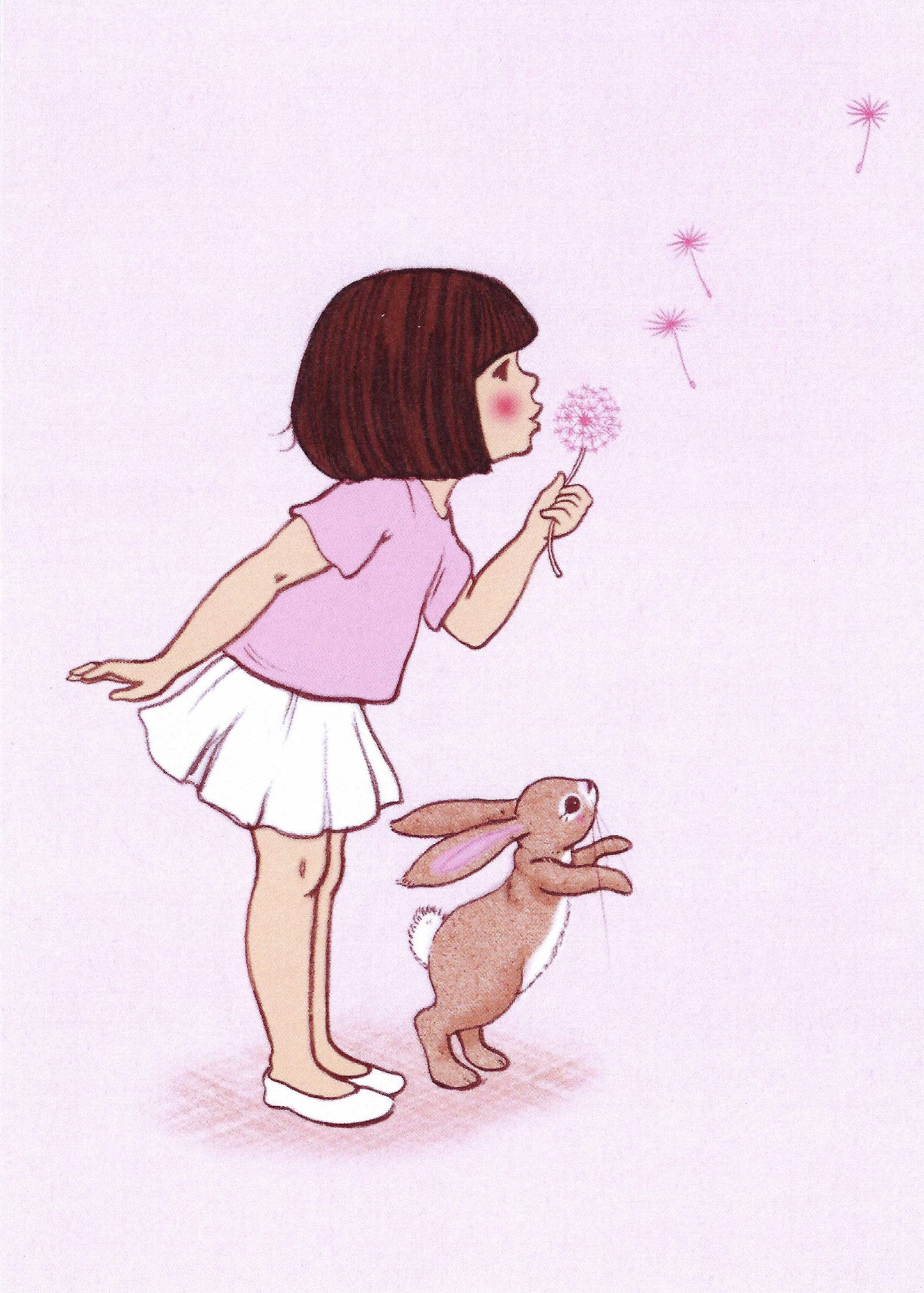 Dandelion Postcard by Belle and Boo featuring an illustration of a girl blowing a dandelion with a rabbit on a pink background