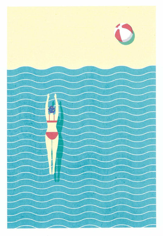 Swimmer Postcard by Nobis Design featuring an illustration of a person swimming in the ocean with a beach ball on the beach in the background
