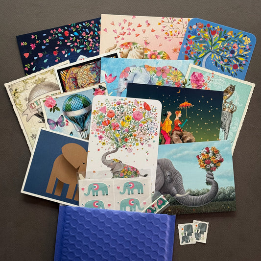 Curated Elephant-themed postcard pack featuring 12 illustrated postcards with glitter, foil, and jagged-edge details, matching stickers, and washi tape—perfect for snail mail lovers, Postcrossing and collectors.