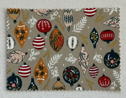 Fabric Postcard with Christmas ornaments on a beige background