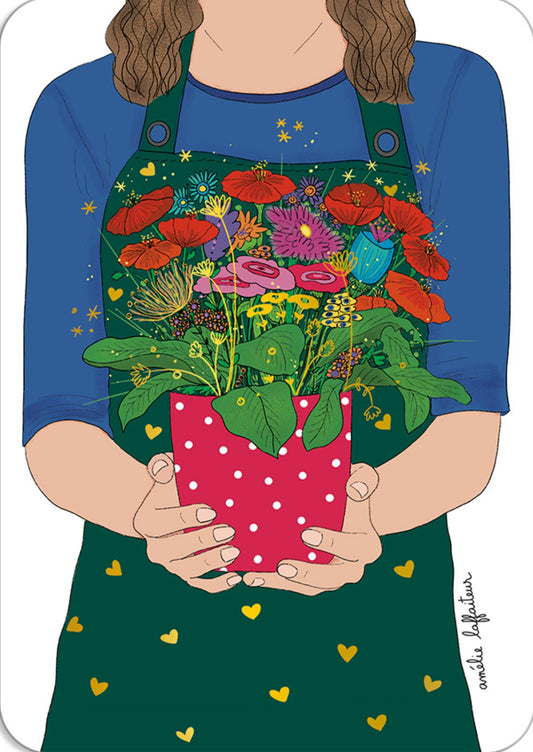 Cartes d'Art postcard featuring a colorful floral bouquet in a red polka‑dot pot, held by a person wearing a green apron.
