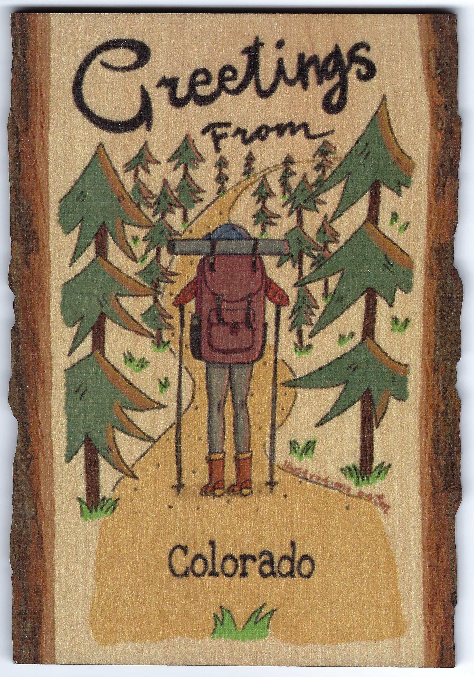 Wooden postcard with a hiker and trees, featuring 'Greetings From Colorado' by DaydreamHQ