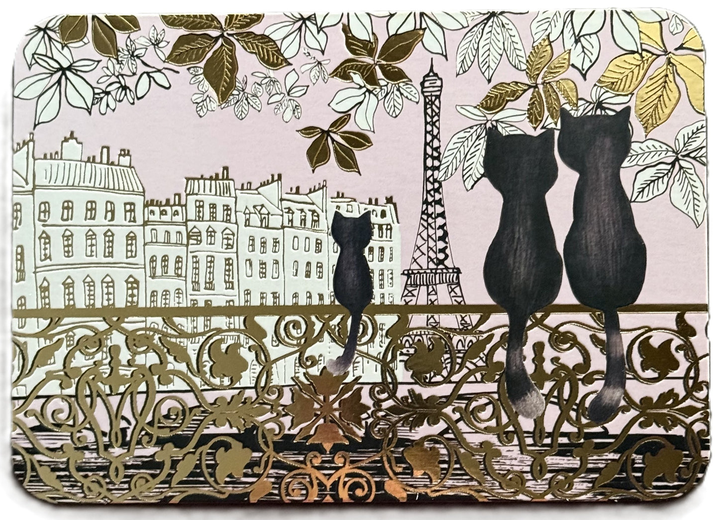 Black Cats in Paris Postcard by Pascale Godard featuring an illustration of cats on a bridge with the Eiffel Tower and Parisian skyline in the background with pretty gold foil details.