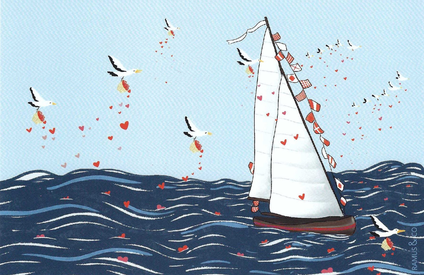 Love at Sea Postcard by Ramus & Company featuring a sailboat with hearts on a blue sky with seagulls dropping hearts from baskets and ocean background