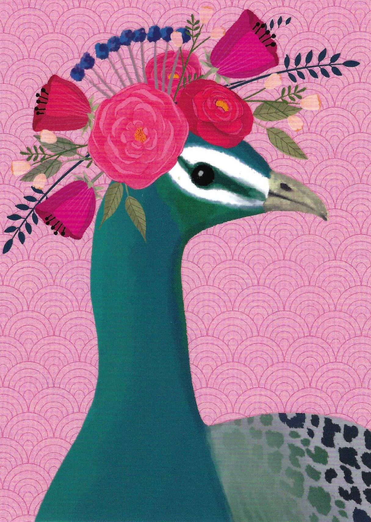 Peacock Postcard by Toni Starck for Nobis Design featuring a peacock with a floral crown of pink and red flowers on a pink patterned background.