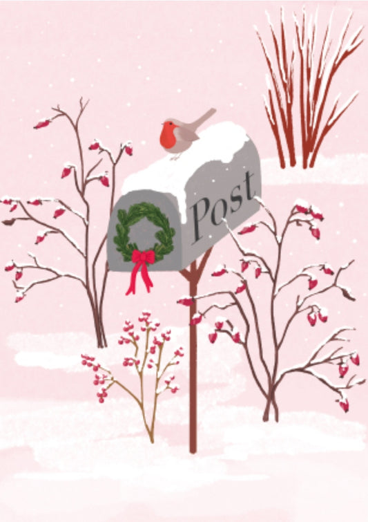Postbox Postcard by Nobis Design featuring a mailbox with wreath and robin on pink snowy background