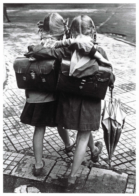 Black and white postcard by Skowronski & Koch featuring two school friends walking together—vintage street scene photography perfect for collectors, snail mail, and Postcrossing.