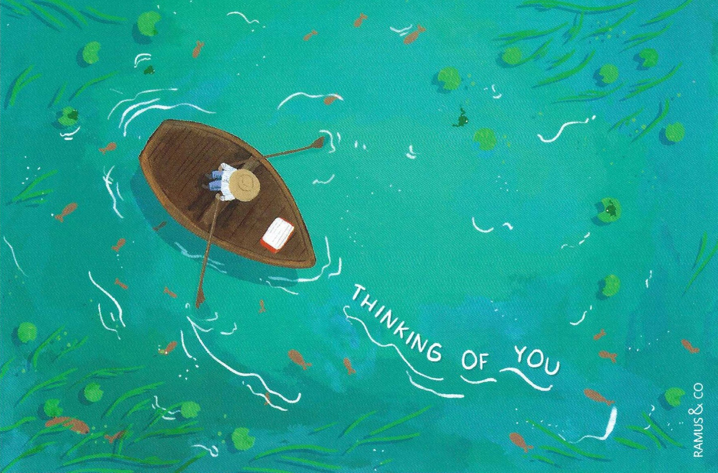 Thinking of You Postcard by Ramus and Co. featuring an illustration of a boat with a person on a teal background, featuring the text 'Thinking of You'.