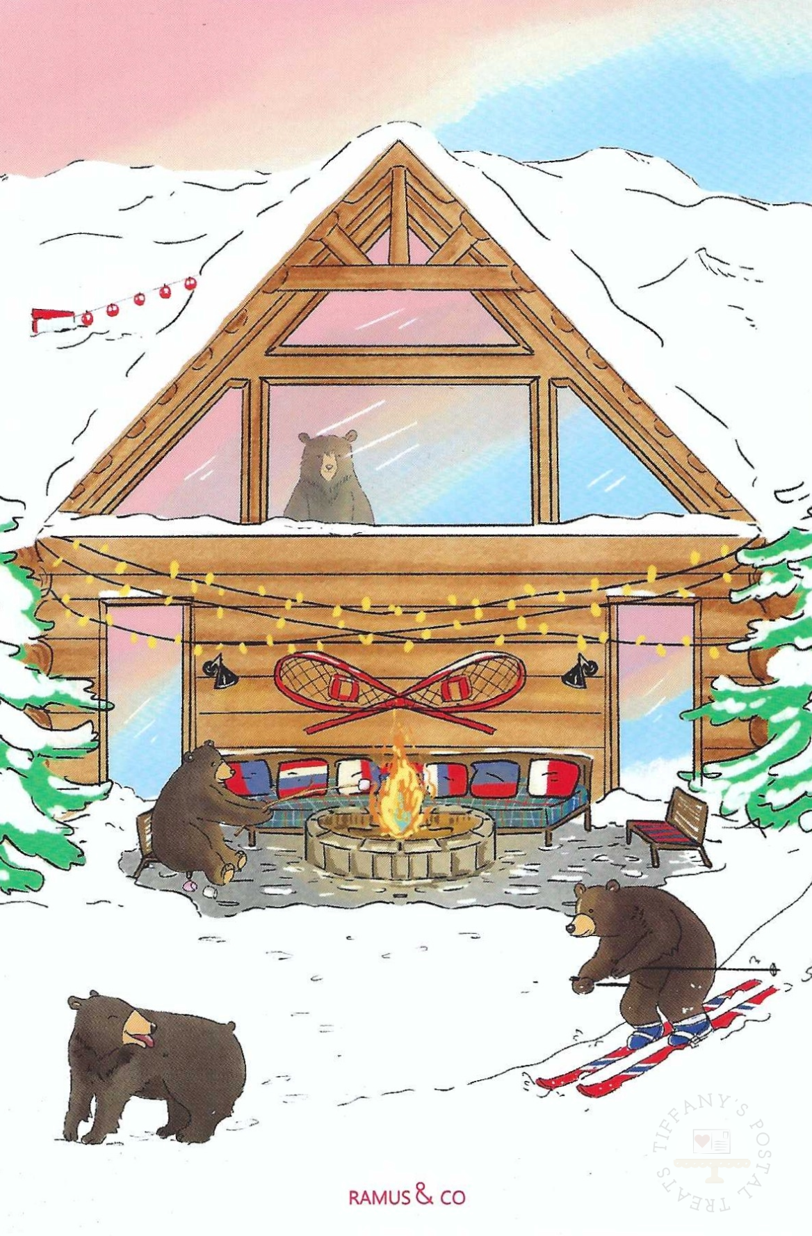 Bear Chalet Postcard by Ramus & Company featuring a wooden cabin with bears in a snowy mountain setting. A bear sits in front of a fire toasting marshmallows, while another is skiing, and a third is visible in the window above.