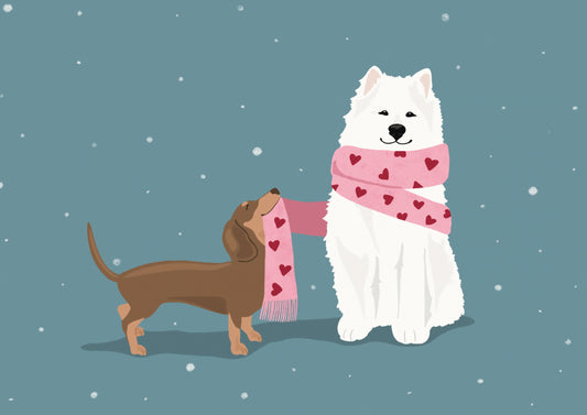 Warm Wishes Postcard by Alfie's Greetings for Nobis Design featuring a white fluffy dog and a brown dachshund with a pink scarf with red hearts, set against a blue-gray snowy background.