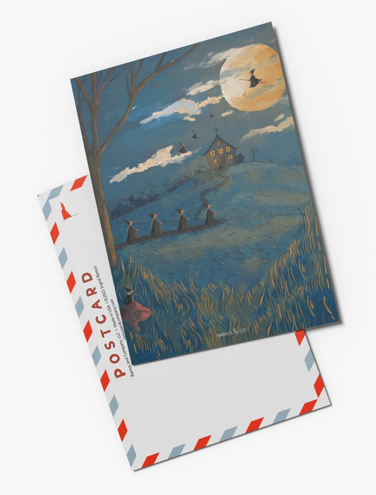 Witchy Postcard by Ramus & Company featuring a whimsical Halloween illustration with witches walking and flying, a full moon and a house in the distance